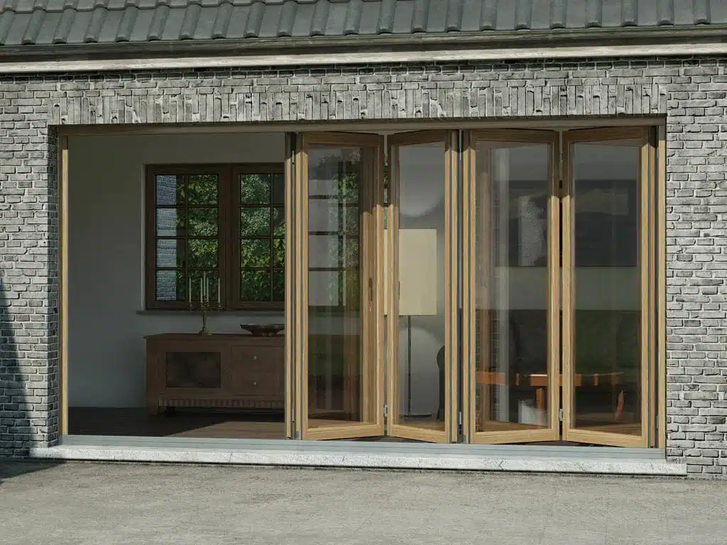Porte accordéon Sunflex en aluminium finition aspect bois, offrant une ouverture totale sur l’extérieur et une luminosité maximale. Un système haut de gamme alliant design chaleureux et performance technique.